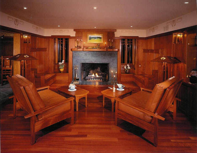 Inspiration for a medium sized classic formal enclosed living room in Los Angeles with brown walls, dark hardwood flooring, a standard fireplace, no tv, a tiled fireplace surround and brown floors.