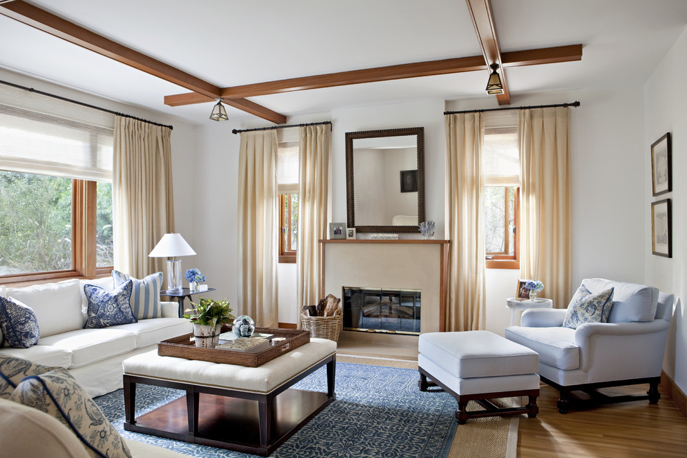 Living room - large transitional living room idea in Los Angeles with white walls and a standard fireplace