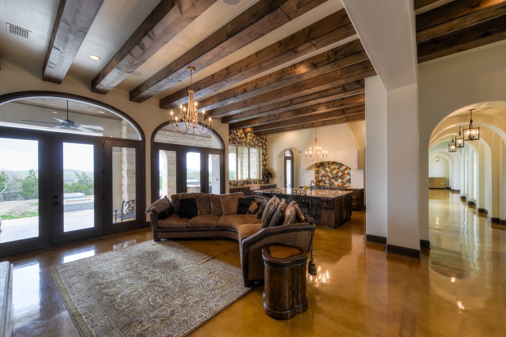 Photo of a large mediterranean formal open plan living room in Albuquerque with medium hardwood flooring.