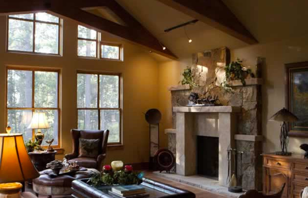 Пример оригинального дизайна: парадная, открытая гостиная комната среднего размера в стиле рустика с коричневыми стенами, паркетным полом среднего тона, стандартным камином и фасадом камина из камня