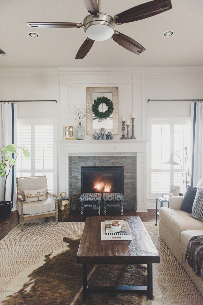 Cottage open concept dark wood floor living room photo in Dallas with white walls, a standard fireplace, a tile fireplace and a wall-mounted tv