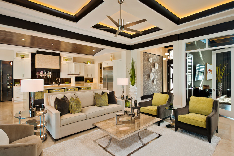 Esempio di un grande soggiorno contemporaneo aperto con pavimento in marmo, pavimento beige e pareti bianche