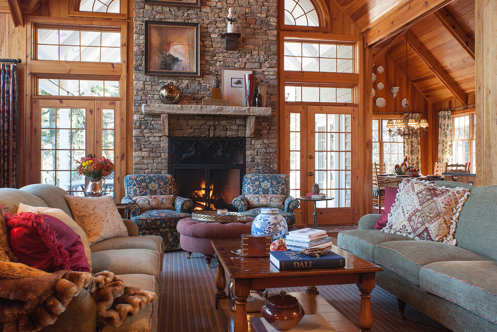 Design ideas for a rustic living room curtain in Charlotte with a stone fireplace surround.