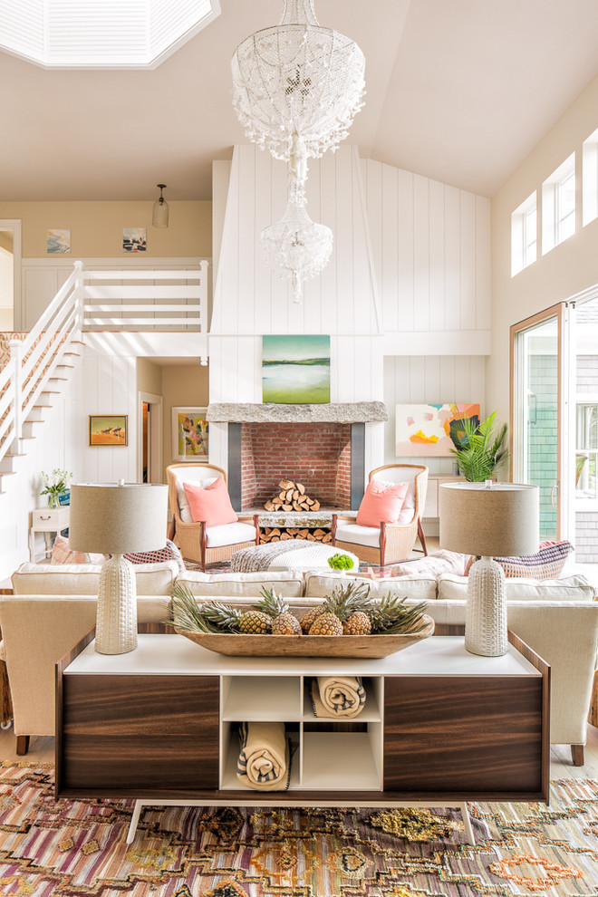 Beach style open concept living room photo in Portland Maine with white walls