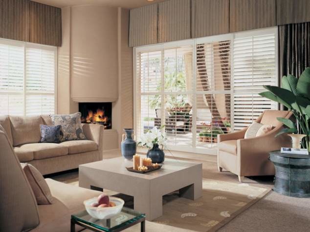 Photo of a medium sized traditional formal enclosed living room in San Francisco with beige walls, carpet, a corner fireplace, a concrete fireplace surround and no tv.