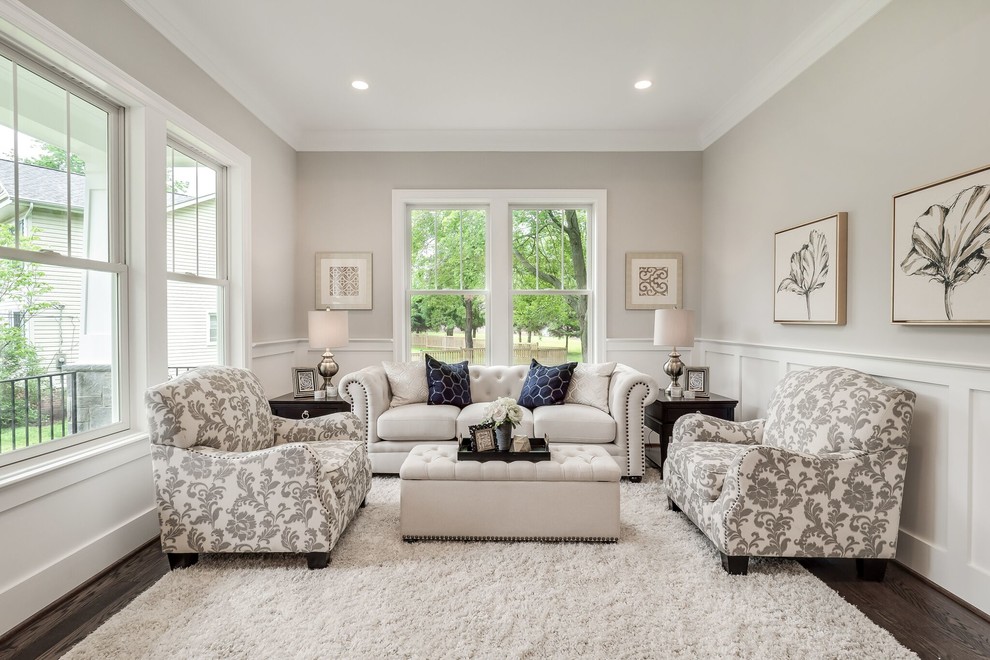 Inspiration for a medium sized traditional formal enclosed living room in DC Metro with grey walls, dark hardwood flooring, brown floors, no fireplace, no tv and feature lighting.