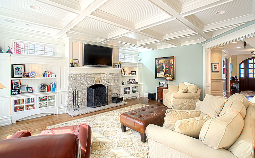 Inspiration for a classic living room in Chicago with a stone fireplace surround.
