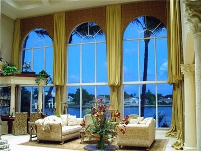 Example of a tuscan living room design in Miami