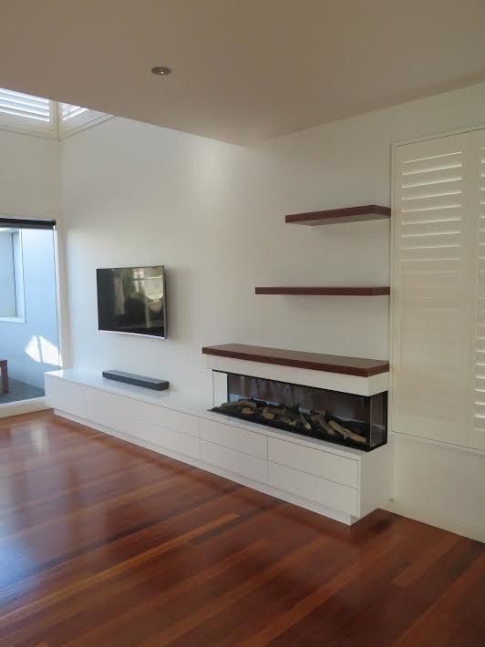 Modernes Wohnzimmer mit Gaskamin in Melbourne