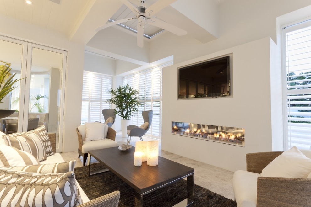 Photo of a medium sized traditional formal open plan living room in Tampa with white walls, marble flooring, a two-sided fireplace, a wall mounted tv and grey floors.