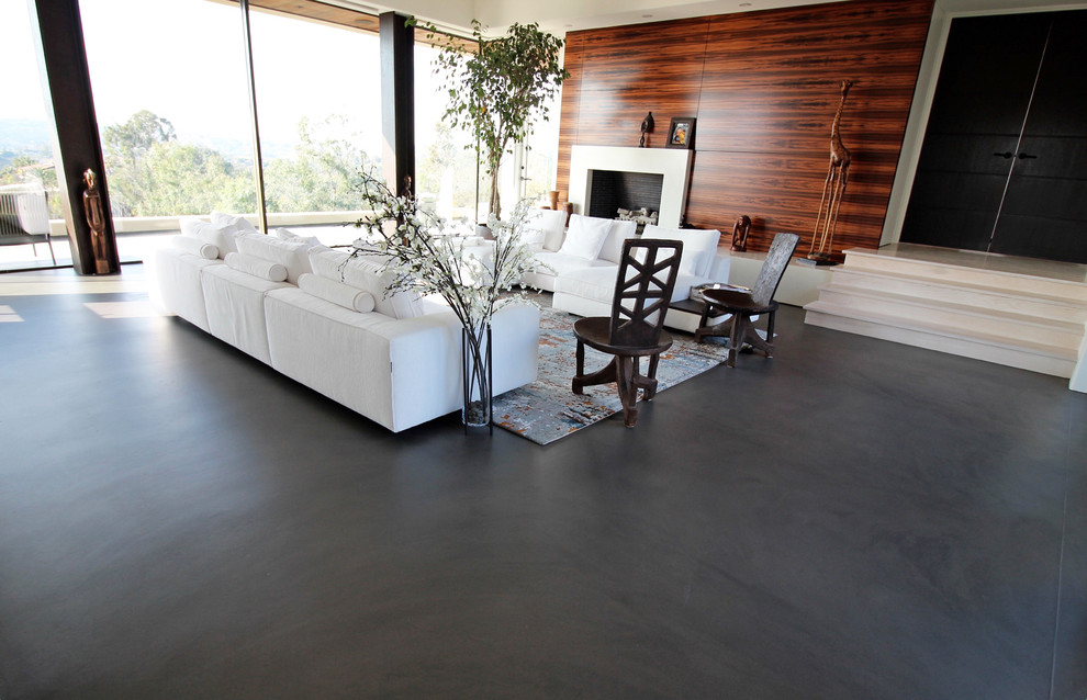 Inspiration for a large modern open concept and formal concrete floor and gray floor living room remodel in San Diego with a standard fireplace, a tile fireplace, beige walls and no tv