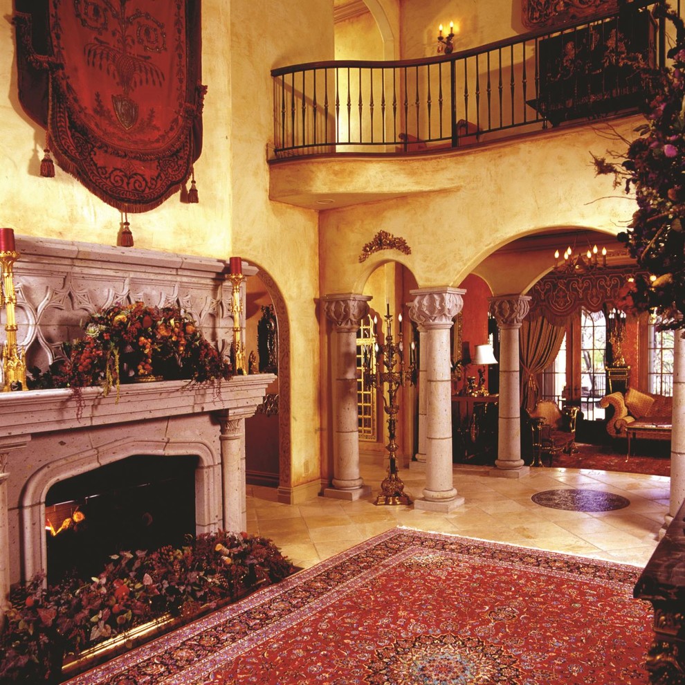 Cette image montre un grand salon victorien ouvert avec une salle de réception, un mur beige, un sol en carrelage de céramique, une cheminée standard, un manteau de cheminée en béton et aucun téléviseur.