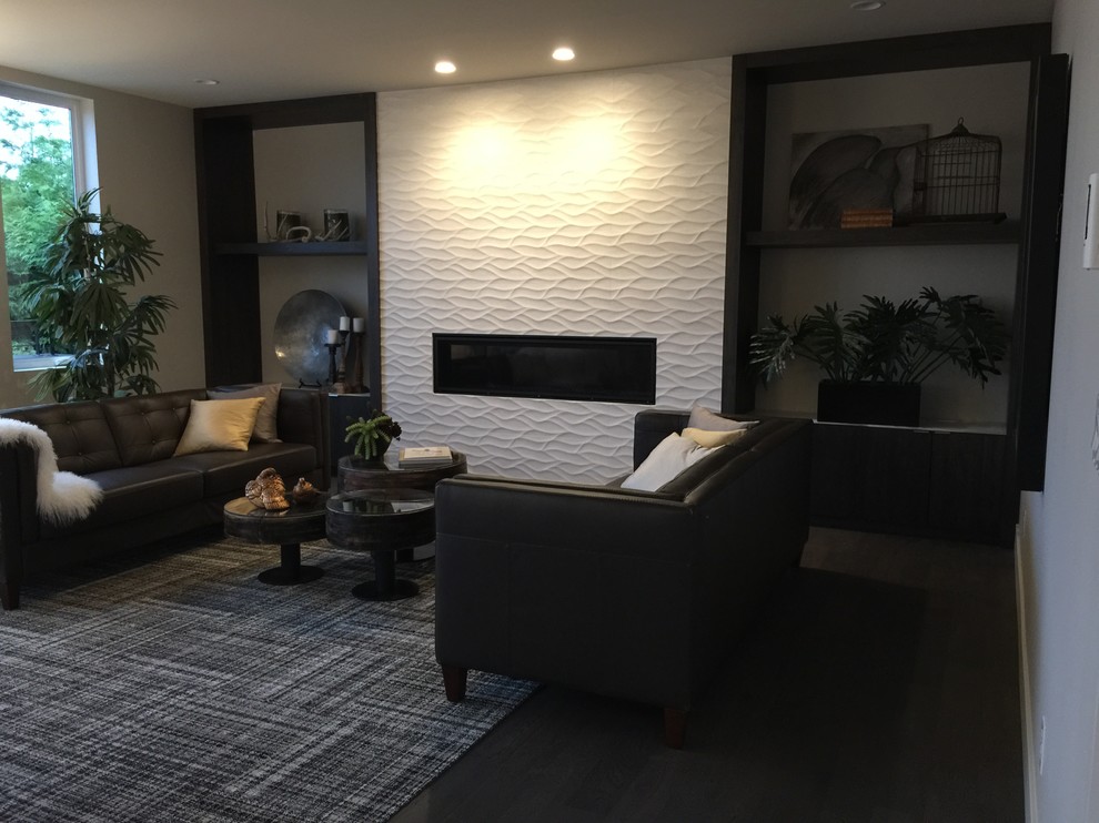Diseño de salón para visitas cerrado moderno de tamaño medio sin televisor con paredes grises, suelo de madera oscura, chimenea lineal y suelo marrón