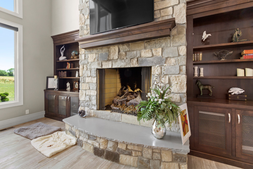 Living room - huge transitional formal and open concept ceramic tile and white floor living room idea in Kansas City with gray walls, a standard fireplace, a stone fireplace and a wall-mounted tv