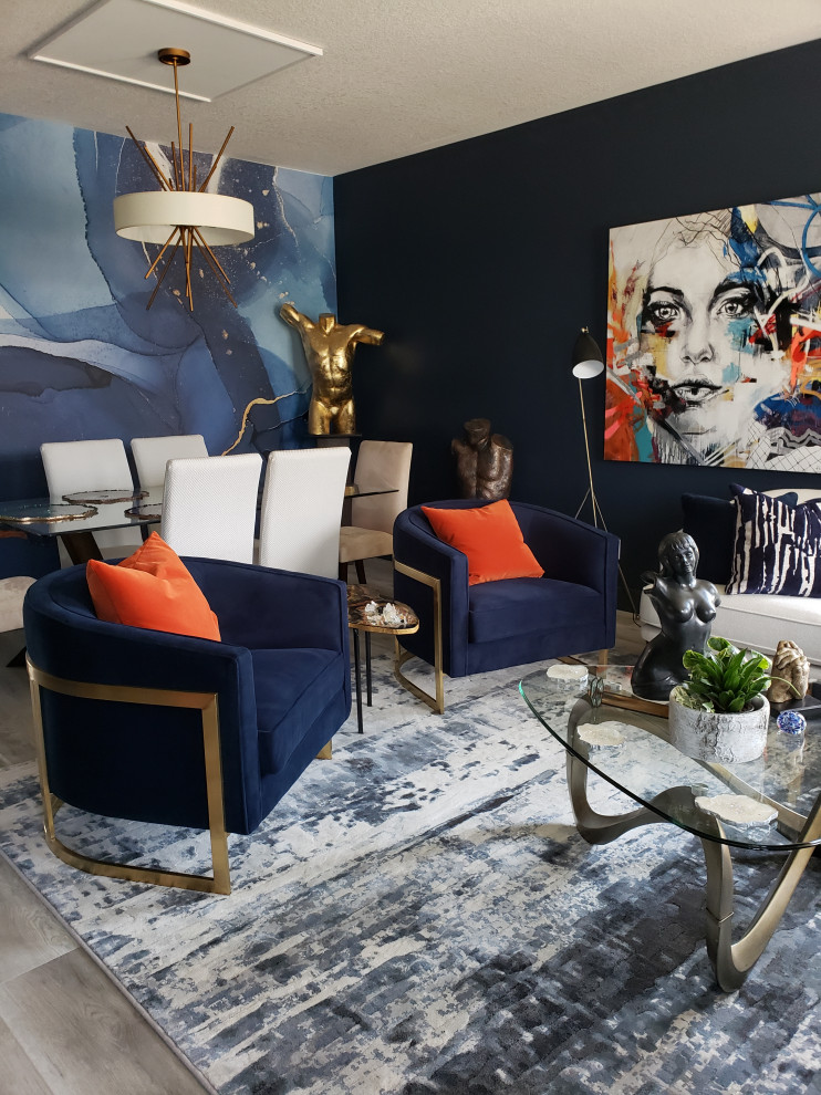 Idée de décoration pour un salon tradition avec un mur bleu.