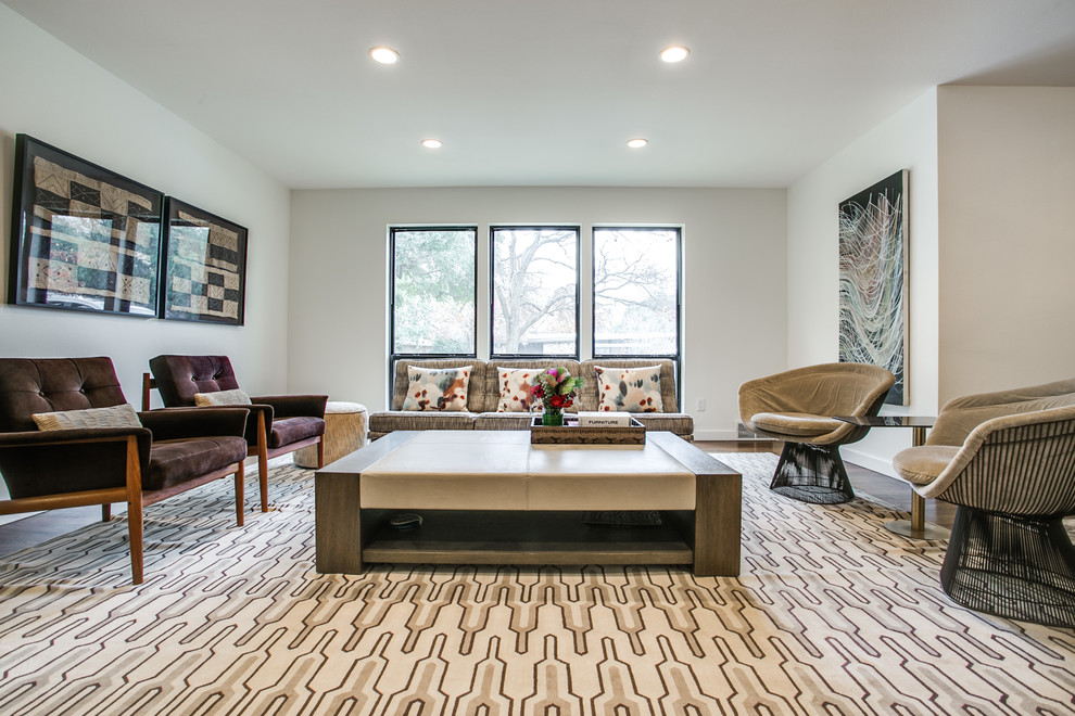 Example of a large 1950s open concept dark wood floor living room design in Dallas