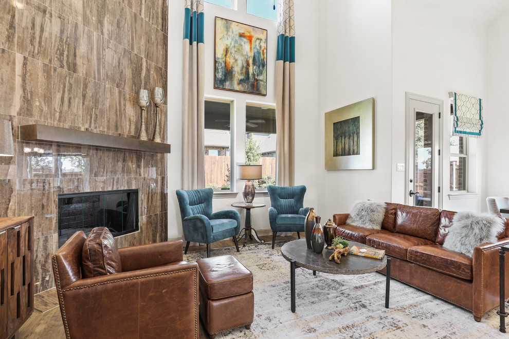 Large classic open plan living room in Dallas with beige walls, medium hardwood flooring, a corner fireplace, a tiled fireplace surround and brown floors.