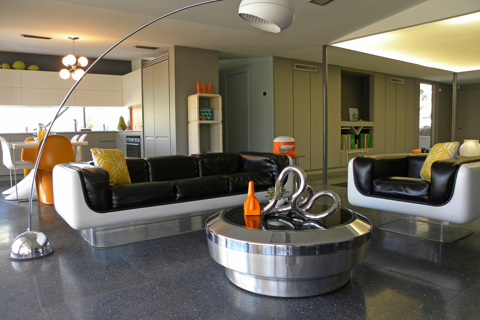 This is an example of a midcentury open plan living room in Dallas.