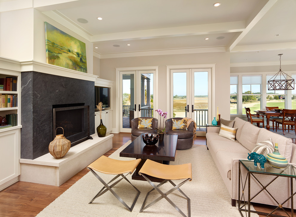 Design ideas for a coastal formal open plan living room in Charleston with a standard fireplace.