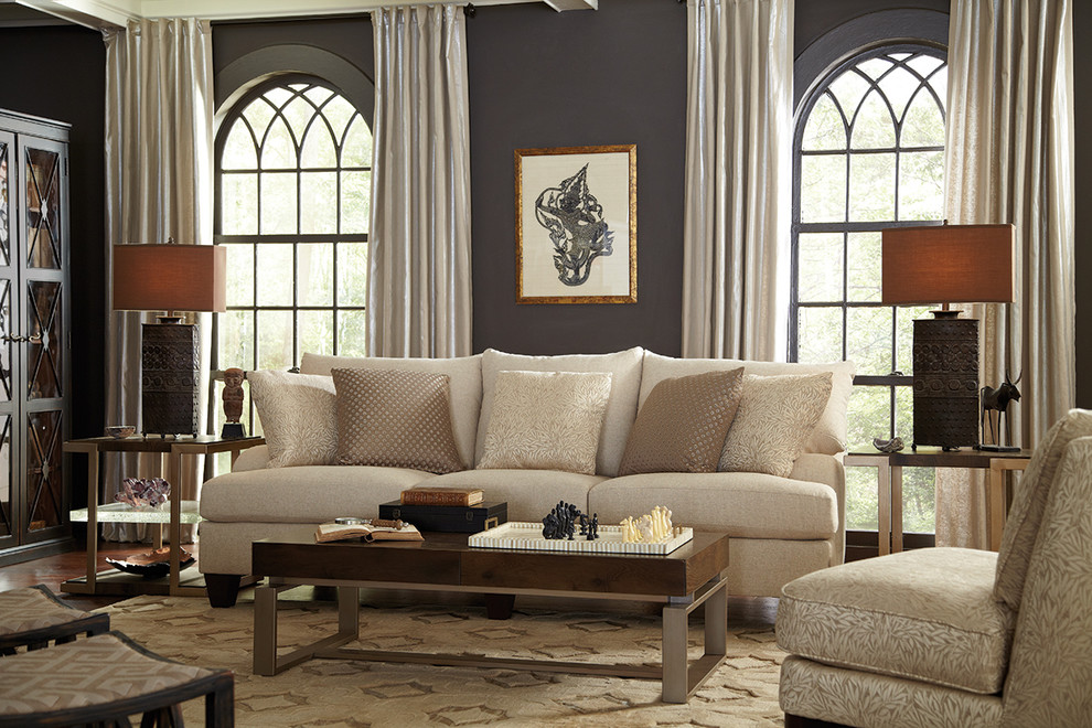 Inspiration for a timeless medium tone wood floor living room remodel in Houston with gray walls, no fireplace and no tv