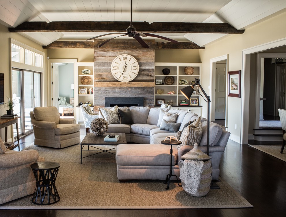 Living room - transitional formal and enclosed dark wood floor living room idea in Charleston with beige walls and a standard fireplace