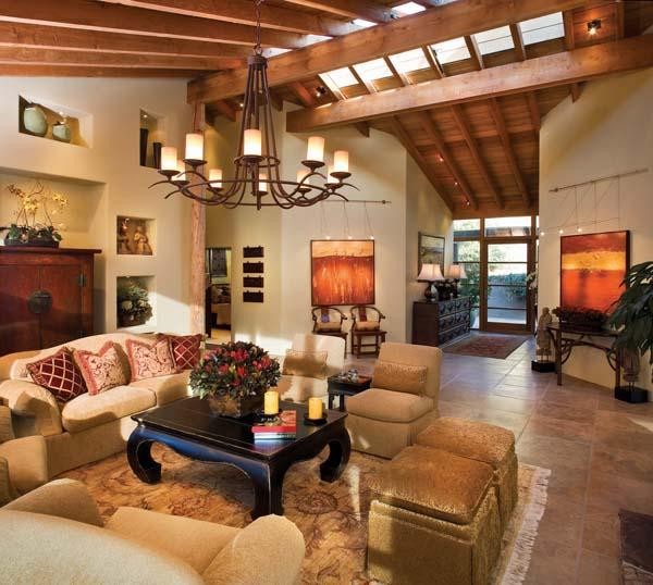 Example of a mid-sized trendy formal and open concept travertine floor living room design in Seattle with beige walls, no fireplace and no tv