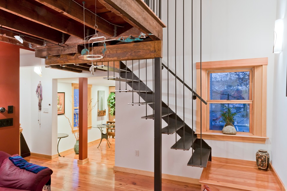 Design ideas for a medium sized modern formal open plan living room in Boston with medium hardwood flooring.