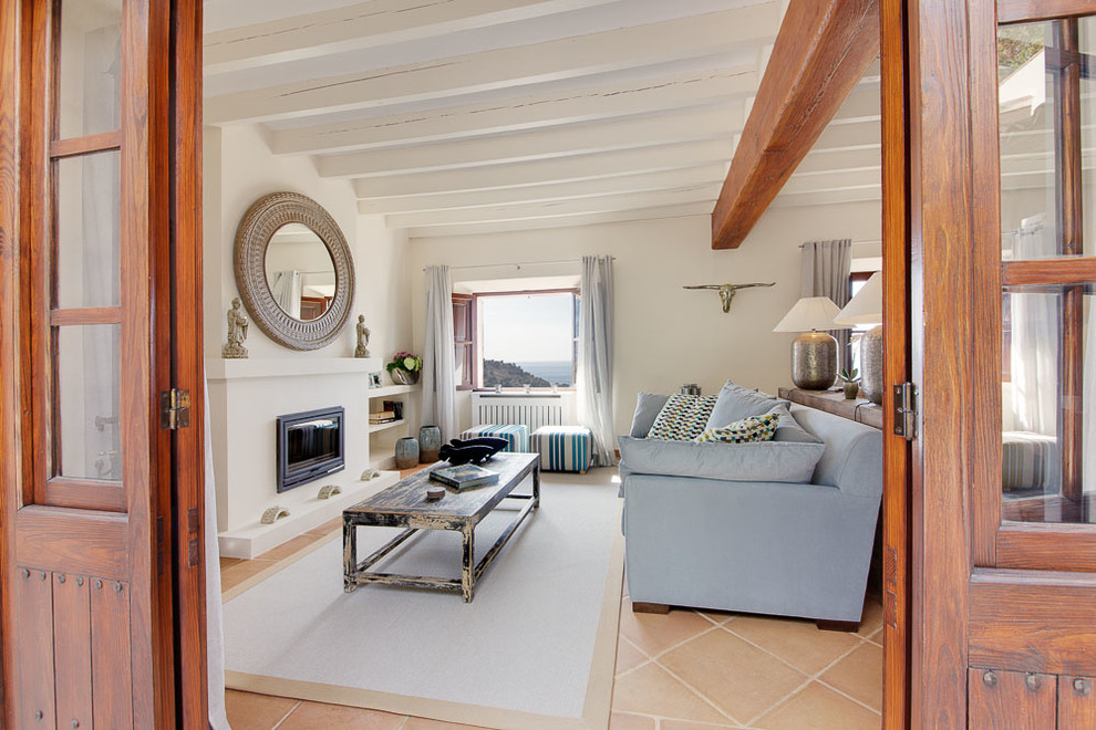 Design ideas for a mediterranean living room in Palma de Mallorca.