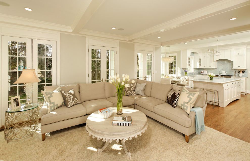 Inspiration for a timeless open concept living room remodel in DC Metro with beige walls