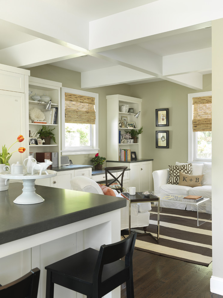 Example of a transitional dark wood floor living room design in Providence with beige walls