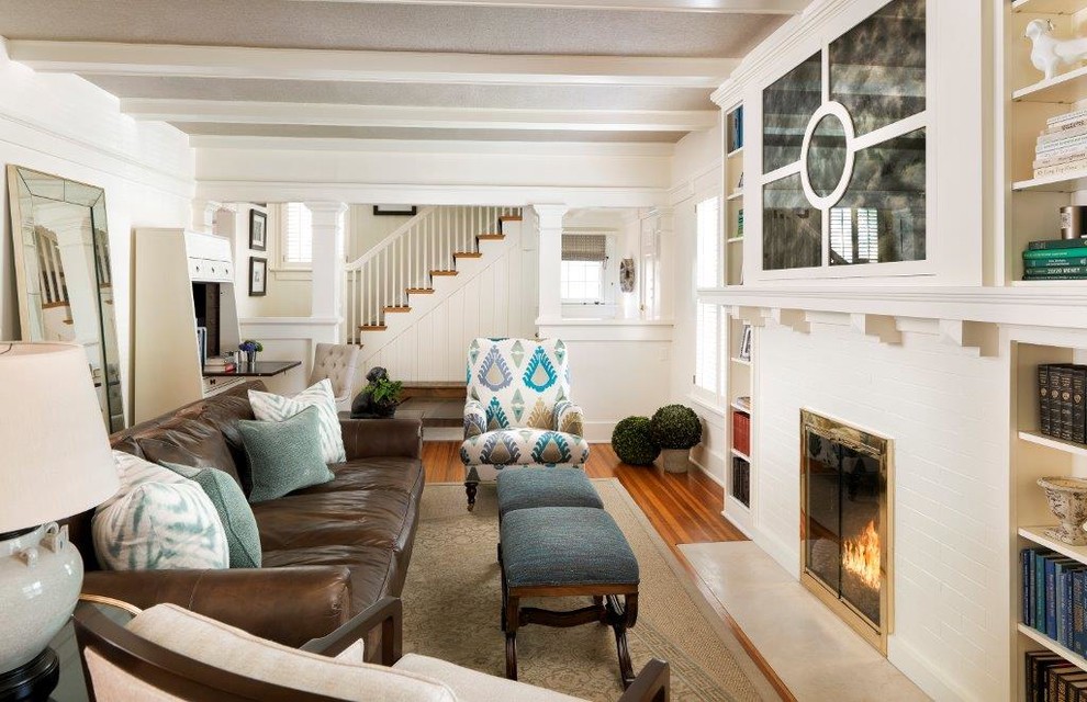 Example of a mid-sized transitional formal and open concept medium tone wood floor and beige floor living room design in Denver with white walls, a ribbon fireplace and a brick fireplace
