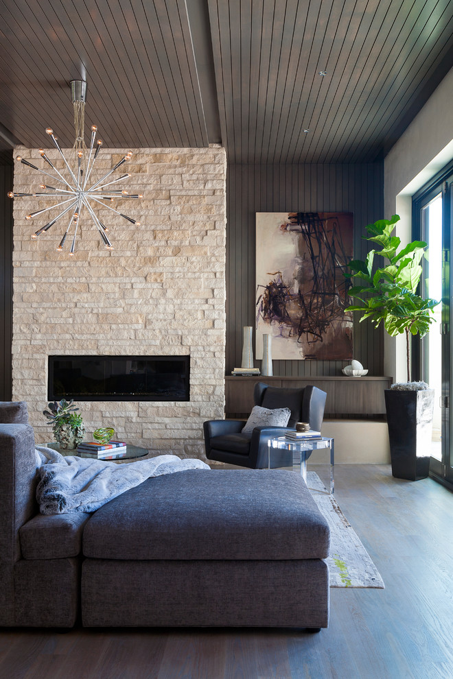 Contemporary open plan living room in Denver with a stone fireplace surround, grey walls, dark hardwood flooring, a ribbon fireplace and grey floors.