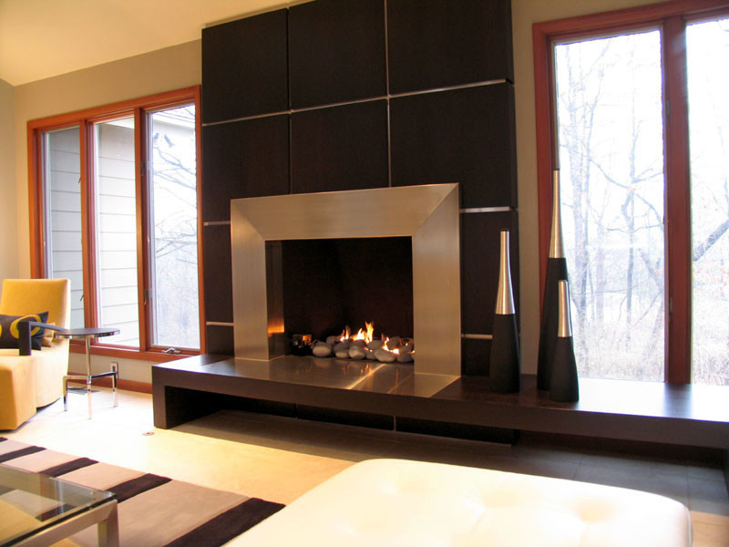 This is an example of a large contemporary open plan living room in St Louis.
