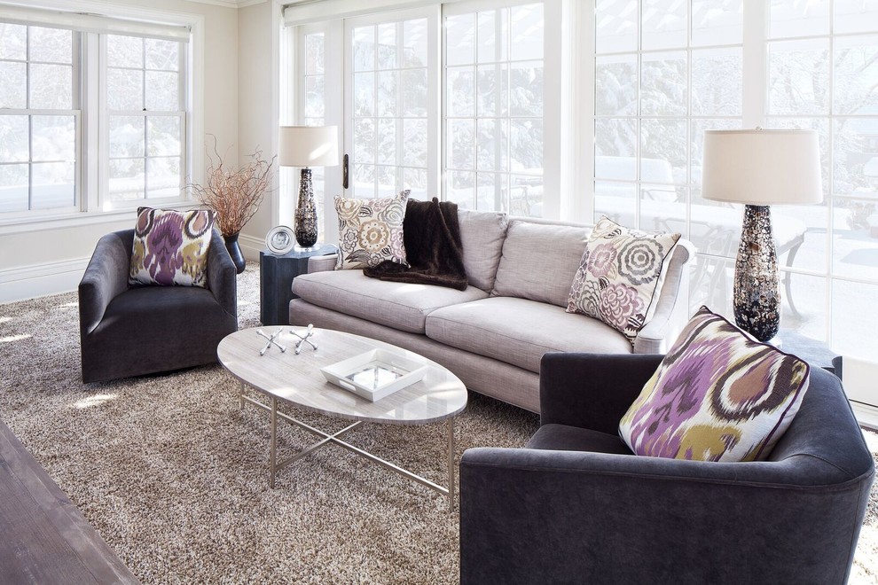 Medium sized traditional formal enclosed living room in New York with beige walls, dark hardwood flooring and brown floors.