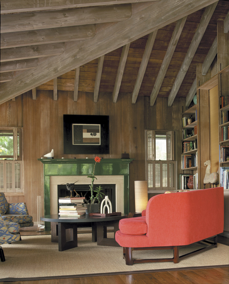 Mountain style living room library photo in Hawaii with a standard fireplace