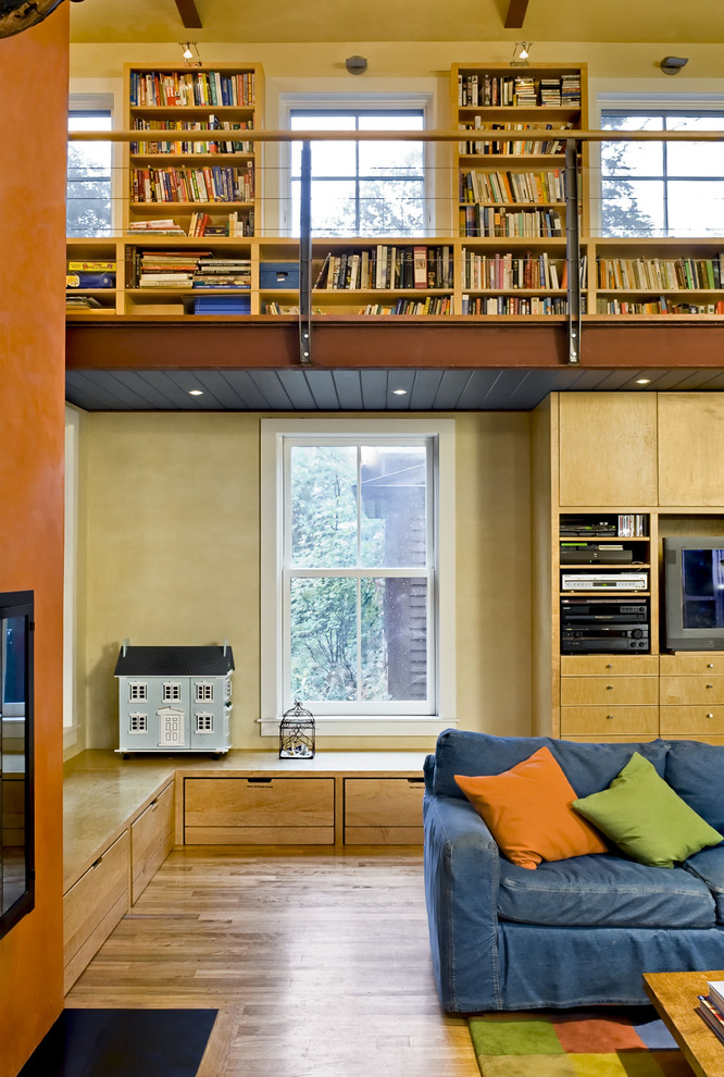 Trendy living room library photo in Burlington