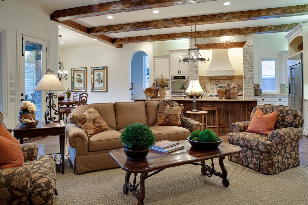 Example of a mid-sized classic open concept and formal dark wood floor living room design in Dallas with beige walls