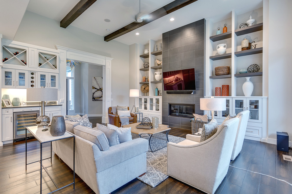 Inspiration for a transitional dark wood floor and brown floor living room remodel in Portland with gray walls, a ribbon fireplace and a tile fireplace