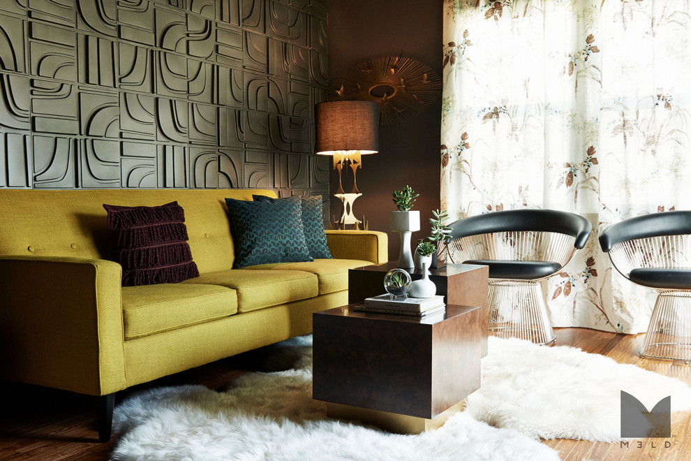 Foto di un piccolo soggiorno minimalista chiuso con pareti grigie, parquet chiaro, nessun camino, nessuna TV e sala formale
