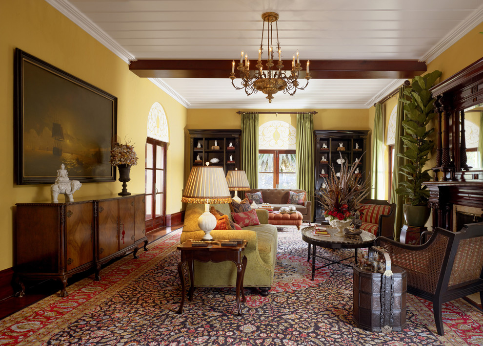 Huge elegant living room photo in San Francisco with yellow walls and a standard fireplace