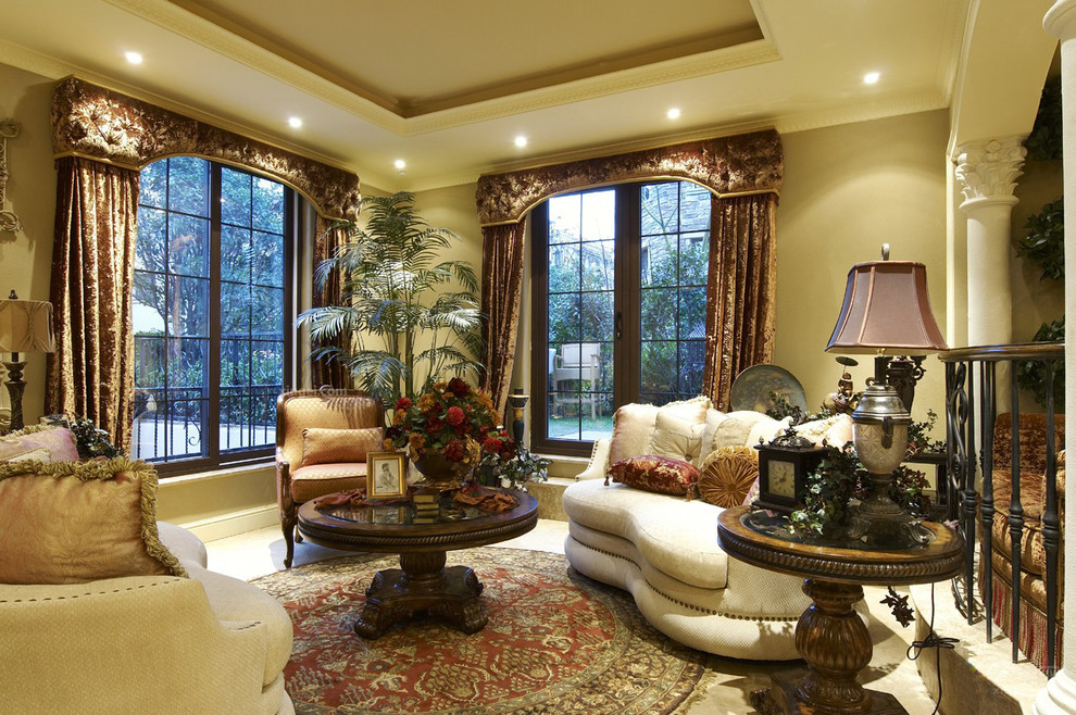 Small victorian formal mezzanine living room in Los Angeles with beige walls and carpet.