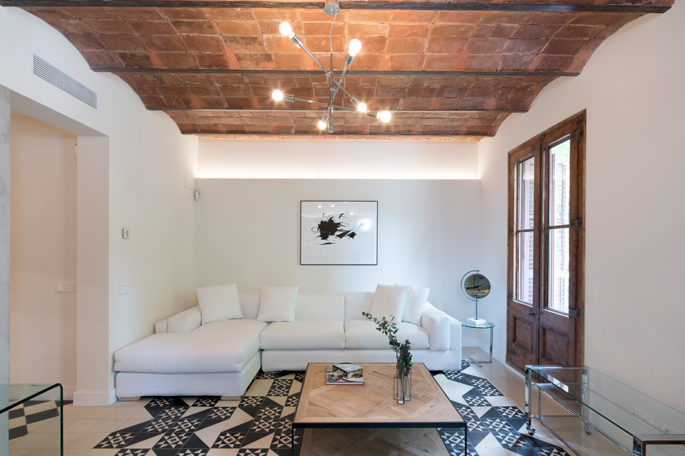 Inspiration for a mediterranean formal multicolored floor living room remodel in Barcelona with white walls