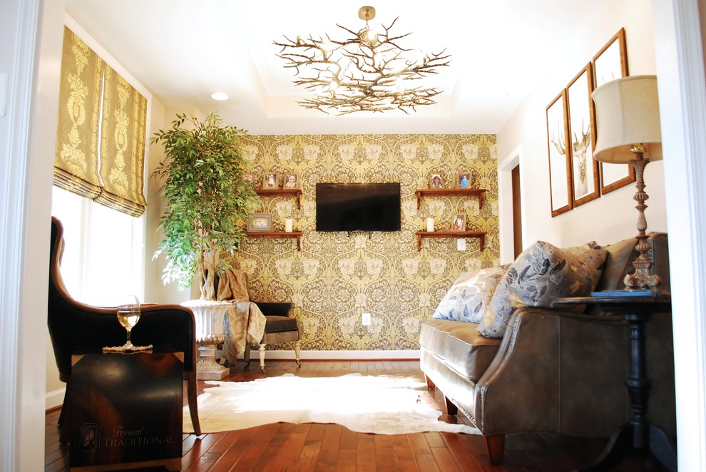 Photo of a medium sized rustic formal enclosed living room in DC Metro with beige walls, medium hardwood flooring and a wall mounted tv.