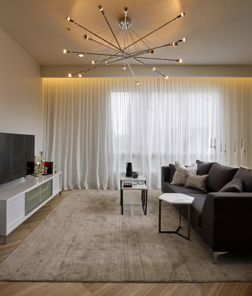 Esempio di un soggiorno moderno di medie dimensioni e stile loft con sala formale, pareti bianche, pavimento in marmo e parete attrezzata