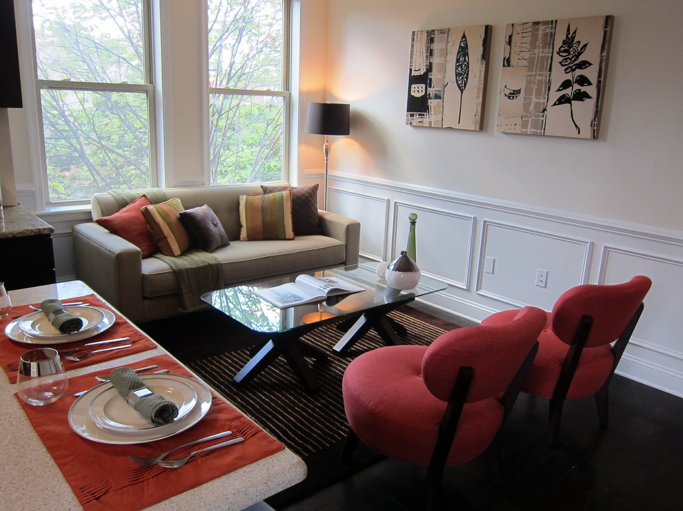 Esempio di un piccolo soggiorno design con pareti beige e tappeto