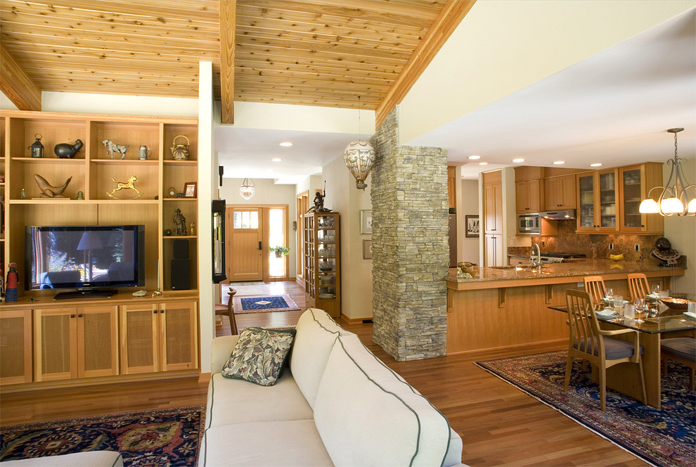 Trendy open concept living room photo in Seattle with a tv stand