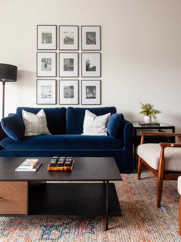 Trendy living room photo in Nashville with white walls
