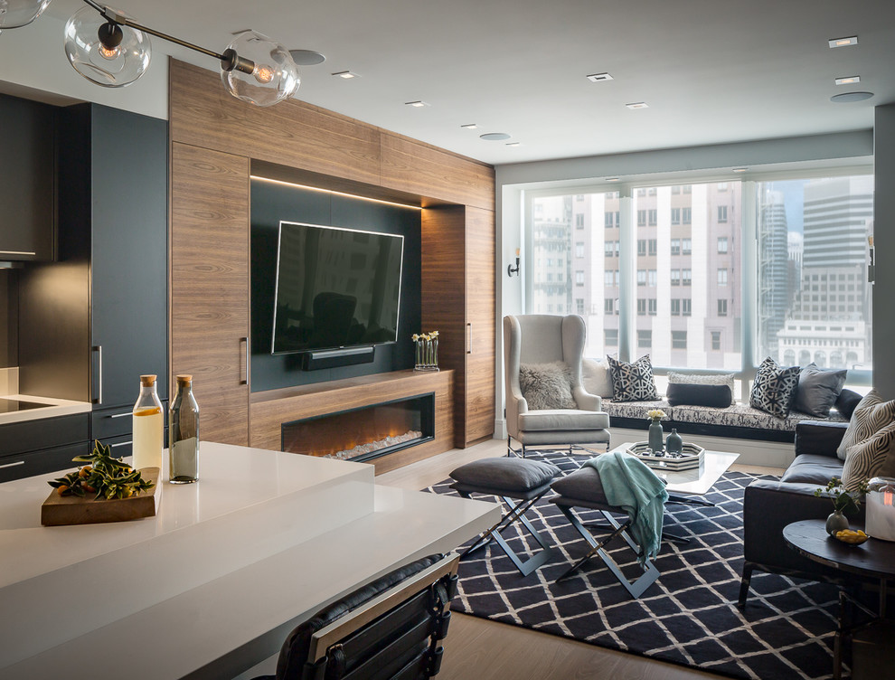 Imagen de salón con barra de bar abierto contemporáneo de tamaño medio con chimenea lineal y televisor colgado en la pared