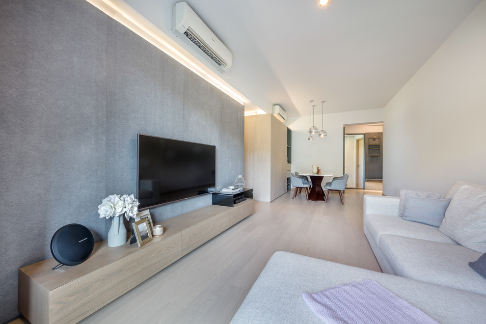 Idee per un soggiorno minimal di medie dimensioni con TV a parete