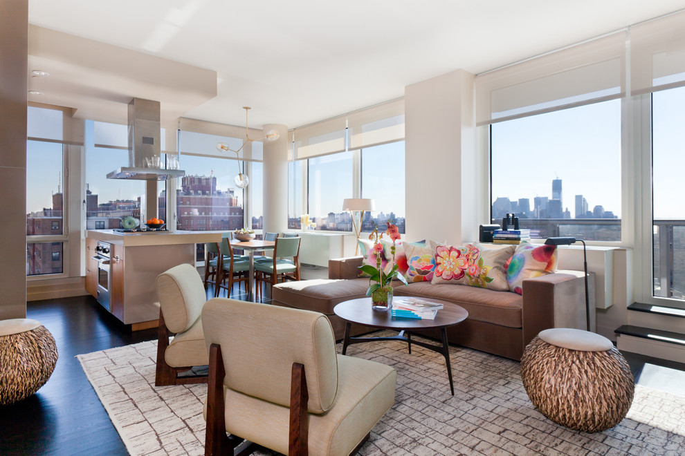 Inspiration for a large contemporary open concept dark wood floor and brown floor living room remodel in New York with white walls, no fireplace, a plaster fireplace and a wall-mounted tv